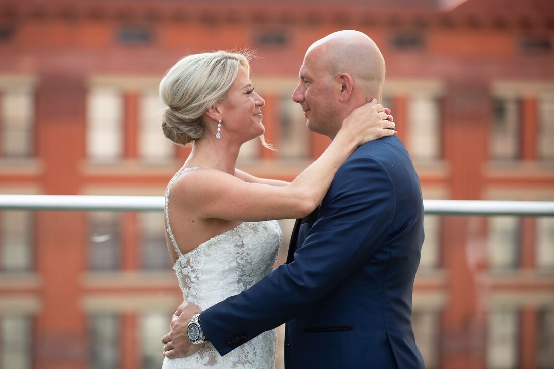 bride and groom on the rooftop of Cleveland's Metropolitan at the 9
