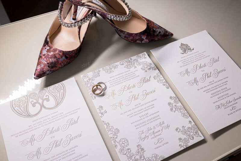 brides shoes and invitations for her three day Sarasota South Asian wedding