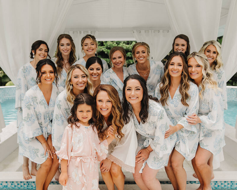 wedding party in floral robes