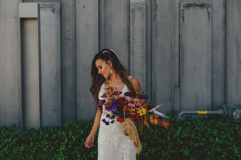 bride with a colorful bridal bouquet