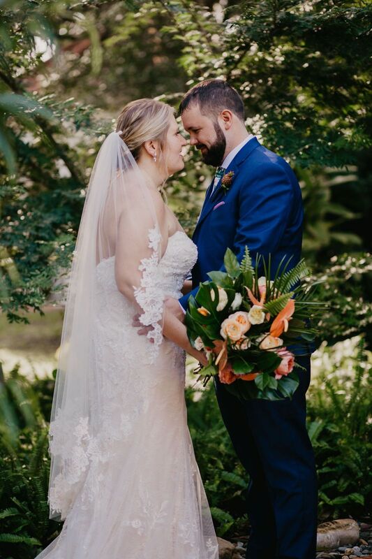 bride and groom in a tropical garden 