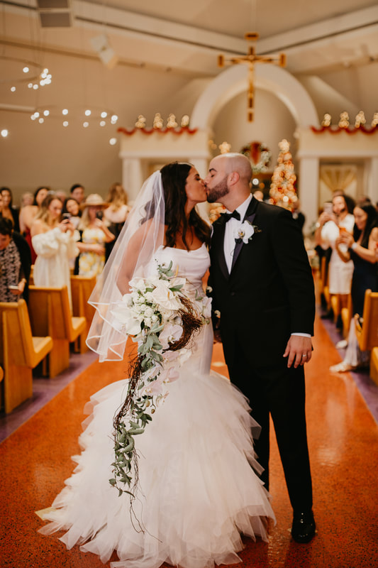 Bride and groom kiss after thier Largo Florida wedding