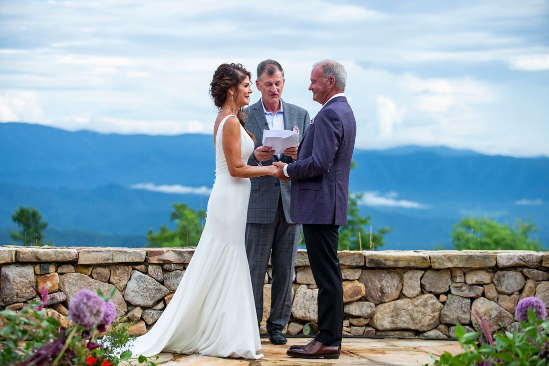 bride and groom exchanging wedding vows at the Blackberry Mountain resort