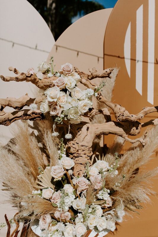 Rustic floral creations in earth tones for a Tampa wedding ceremony