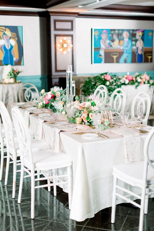 Jennifer Matteo Event Planning -Saint Petersburg wedding – Vinoy wedding - Vinoy wedding reception  - white infinity chairs - pink and white centerpieces - floating candles 