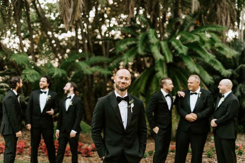 groom with his groomsmen at Selby Gardens in Sarasota