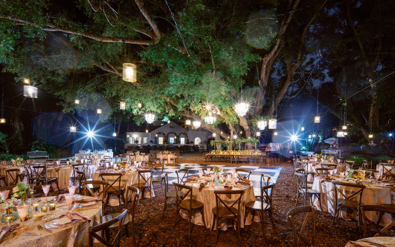 nighttime wedding reception with chandeliers in Sarasota
