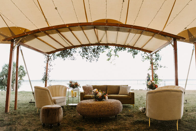 Sail cloth tent with eclectic lounge furniture at Powel Crosley Estate