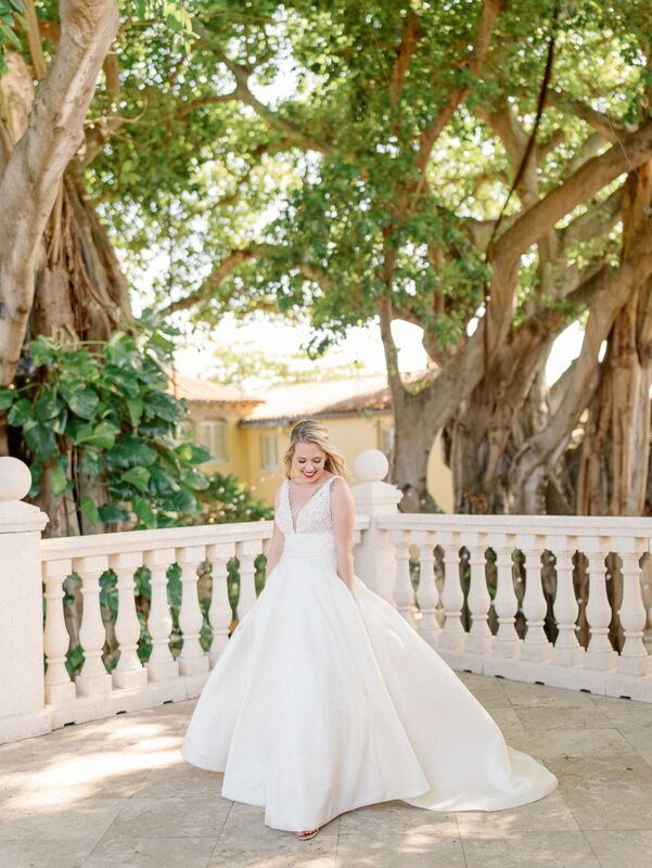 Bride and a white ballgown with lace detailing at The Addison in Boca Raton