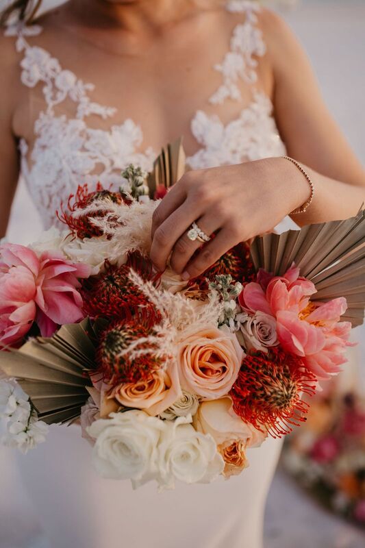 Boho bridal bouquet in blush, coral and taupe