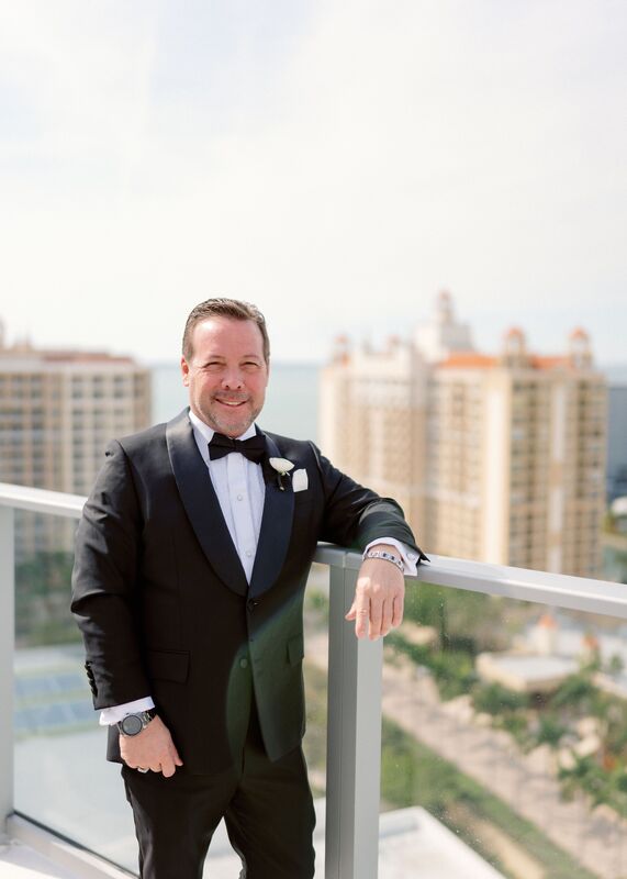grooming black tuxedo on the rooftop of the Westin Sarasota