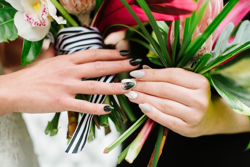 Jennifer Matteo Event Planning  - Pass A Grille wedding – Red Mesa Cantina wedding reception – Tropical wedding – St Petersburg wedding -
tropical bridal bouquet - bride with black and white nails