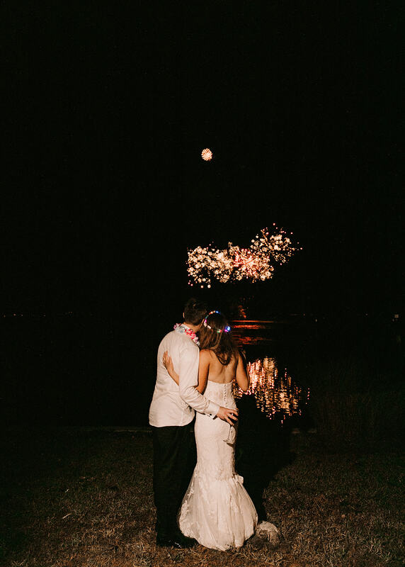 Bride and groom watching their fireworks display 
