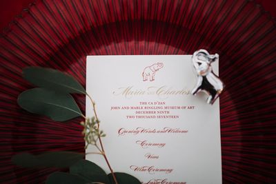 Jennifer Matteo Event Planning – Sarasota Wedding Planner – Florida Luxury Wedding Planner – Ringling Wedding – Sarasota Wedding - red wedding decor, red charger plate - custom menu cards