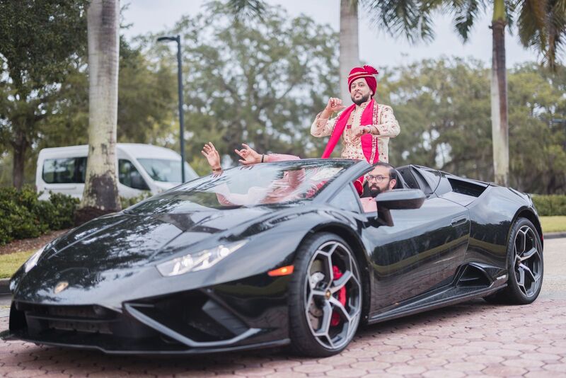 A South Asian Baraat with the groom ariving in a Lamborghini!