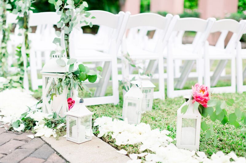 Jennifer Matteo Event Planning -Saint Petersburg wedding – Vinoy wedding - Vinoy outdoor wedding ceremony - white garden chairs - white lanterns - white ceremony decor