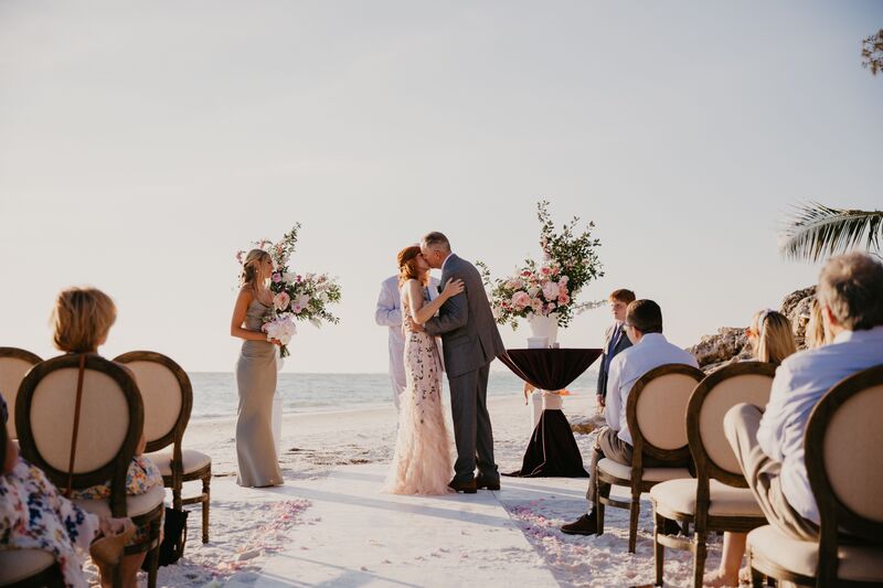 bride and groom kissing after their Siesta Key beach wedding