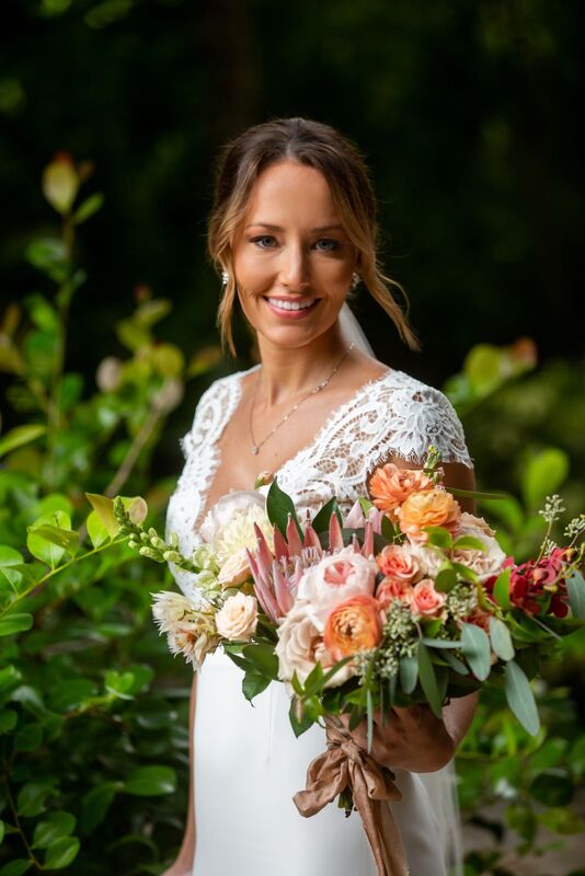 bride with boho inspired bridal bouquet 