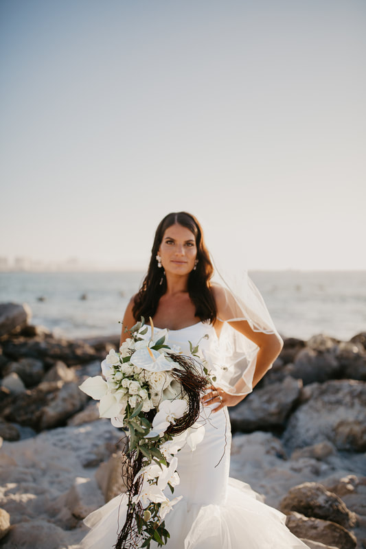 bride on the rocks at Clearwater Beach
