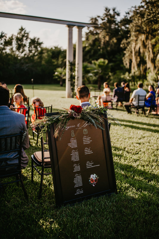 Custom wedding seating chart for wedding ceremony at Marie Selby Gardens