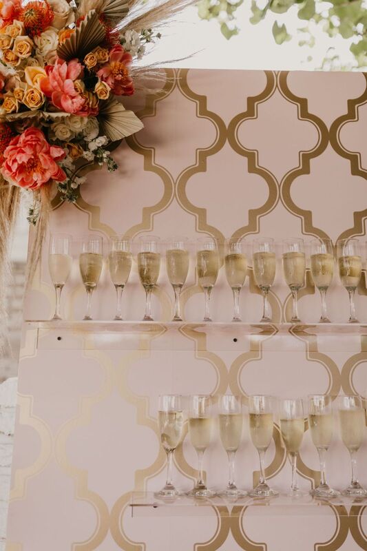 One-of-a-kind champagne wall at a Siesta Key beach -Boho wedding