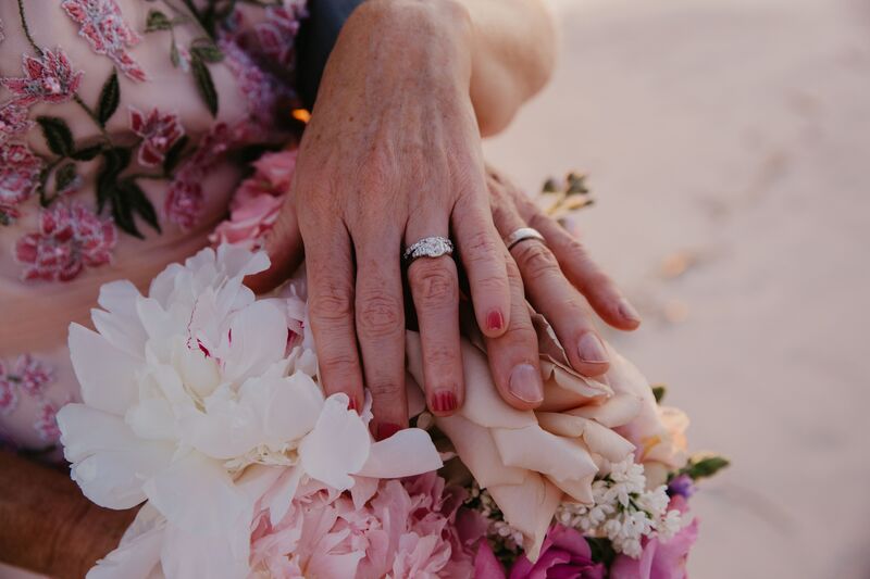 Closeup of wedding rings on Siesta Key