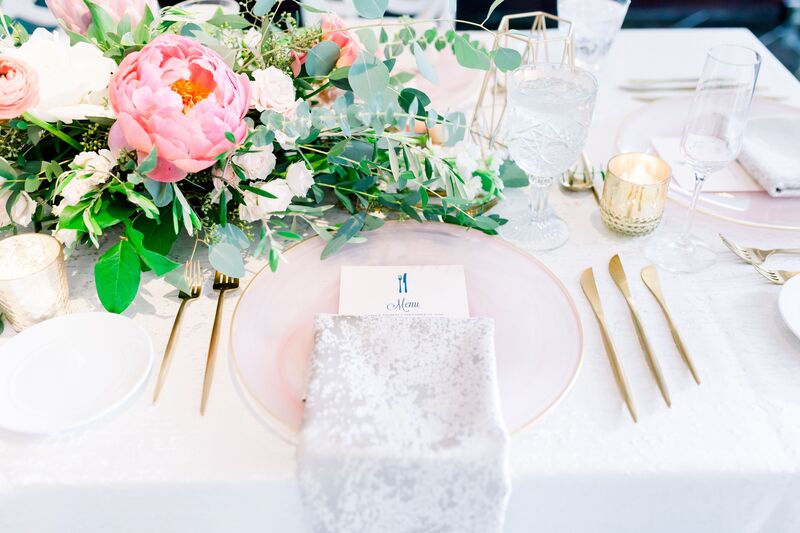 Jennifer Matteo Event Planning -Saint Petersburg wedding – Vinoy wedding - Vinoy wedding reception  - white infinity chairs - pink and white centerpieces - floating candles - custom menu cards - gold flatware - contemporary china