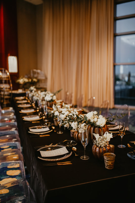 Elegant New year's Eve Clearwater wedding reception in black and white with metallics. 