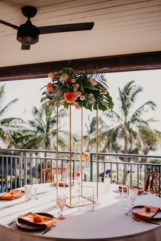 Tropical inspired wedding reception at the Ritz Carlton Beach Club in Sarasota, Florida