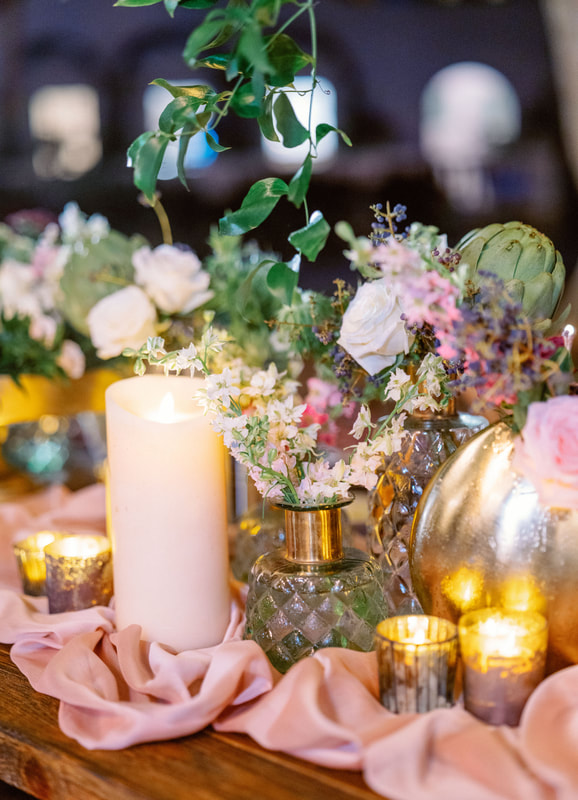 candles and beautiful flowers at Marie Selby Gardens wedding