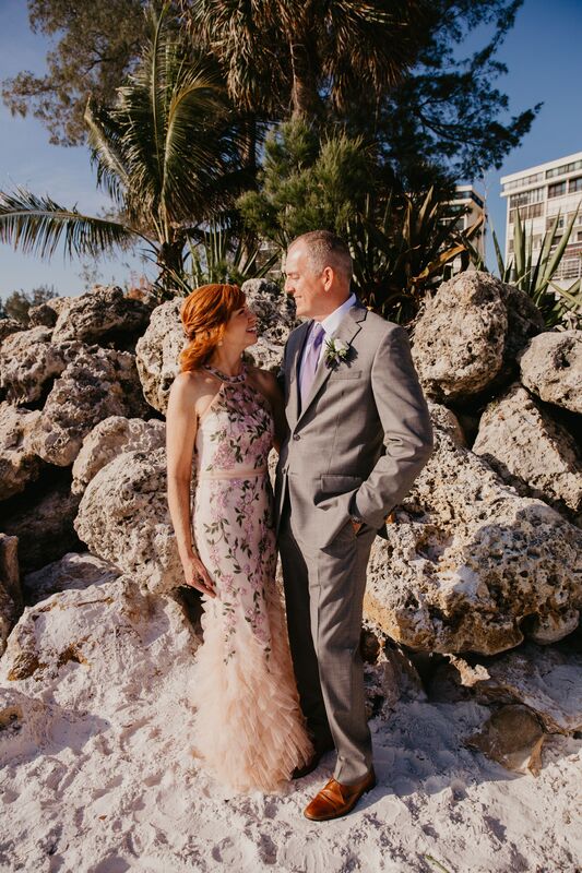 Newlywed couple at sunset on Siesta Key Beach