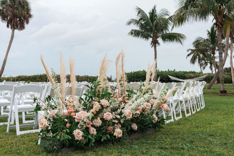 long low ceremony floral designs with pampas grass