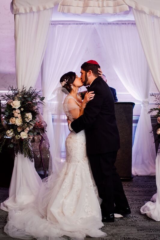 Jennifer Matteo Event Planning –Sarasota wedding planner-Sarasota Jewish wedding- Sarasota wedding-romantic weddings- jewel tone weddings- burgundy and blush wedding-first kiss