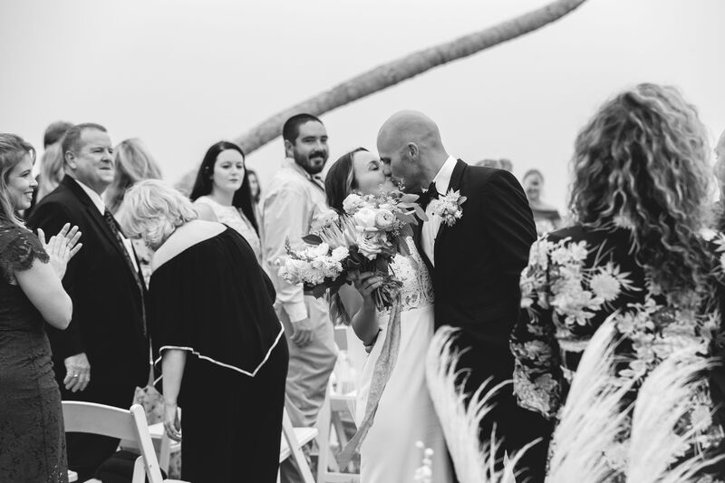 black and white photo Casa Ybel bride and groom kissing