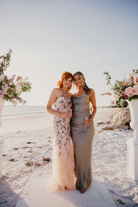 Bride and bridesmaid on Siesta Key beach