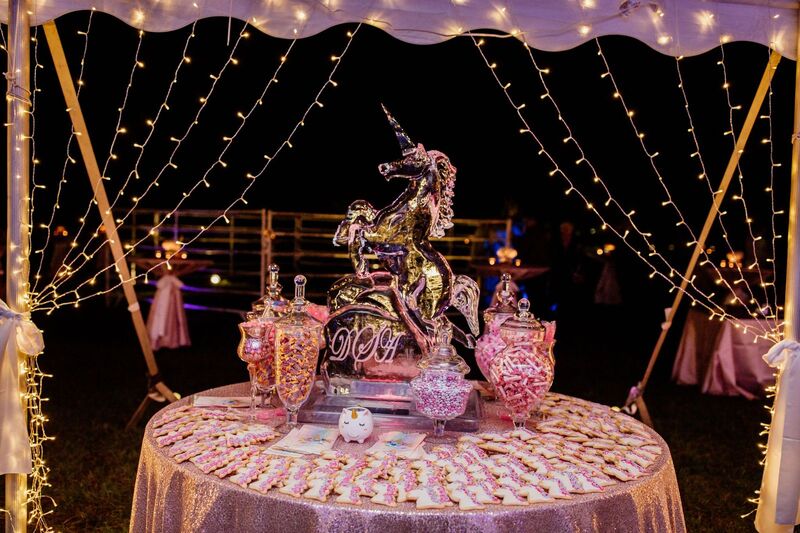 candy buffet with a unicorn  ice carving at a Venice Florida wedding