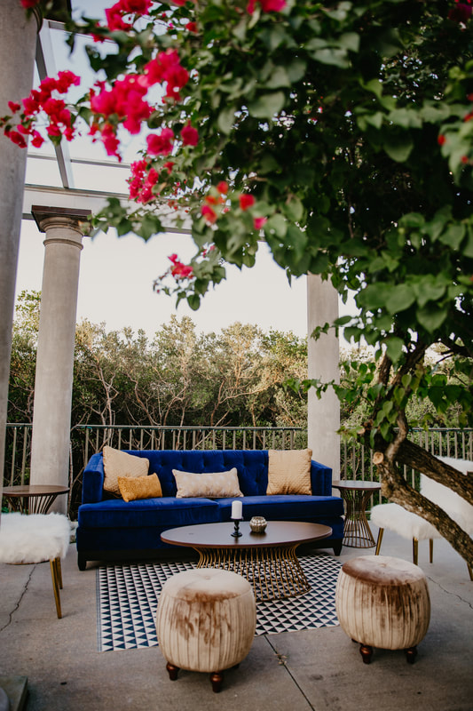 rich jewel tone lounge furniture at Selby Gardens wedding
