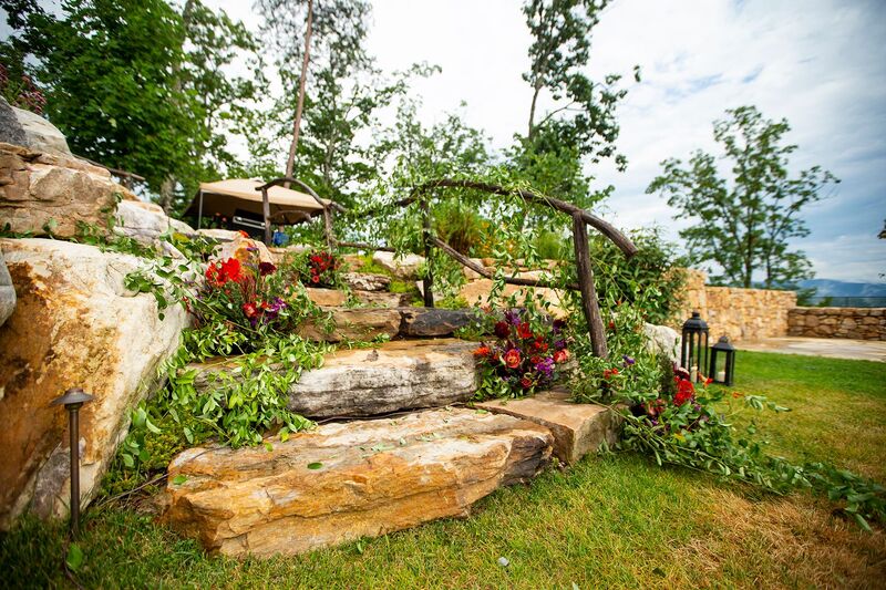 rustic outdoor setting for welcome reception at Blackberry Mountain