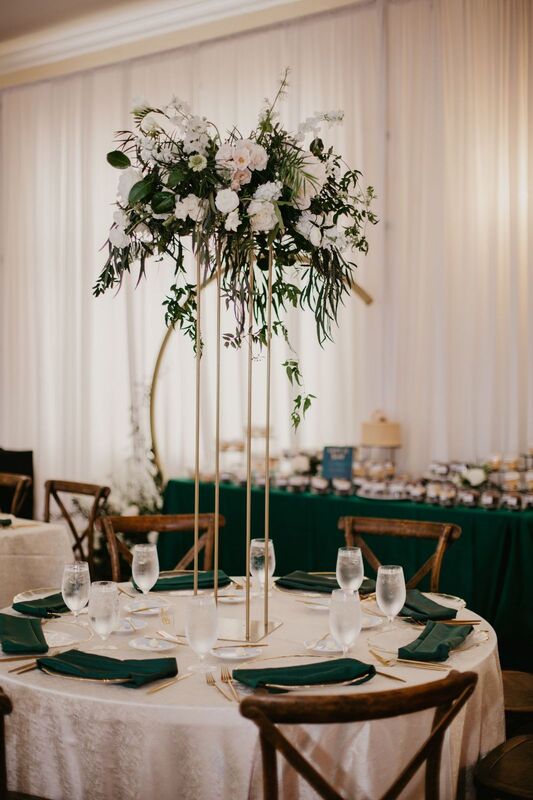 Hunter green, white and gold reception decor for a Tampa wedding at The Orlo