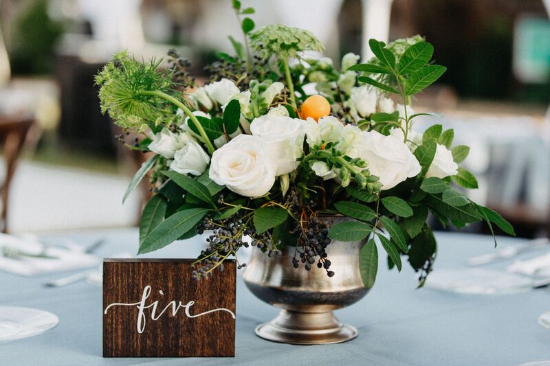 Bay Preserve at Osprey -Bay Preserve wedding – Sarasota wedding – Sarasota wedding planner – Sarasota luxury wedding planner - wedding reception - tented wedding reception - outdoor wedding reception - white and green centerpieces - centerpieces with kumquats
