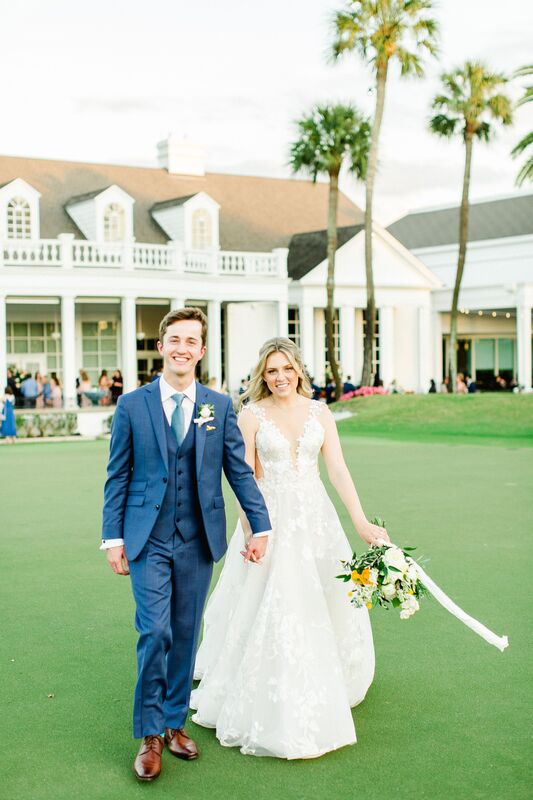 bride and groom on the lawn at Palma Ceia Golf and County Club in Tampa