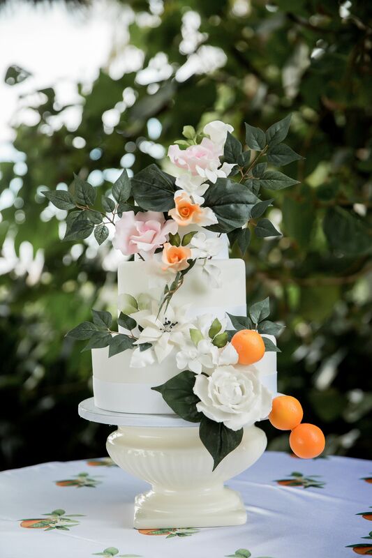 Sarasota wedding – Ringling wedding – Sarasota wedding planner – Sarasota luxury wedding planner – Orange wedding décor – Florida oranges in wedding décor - wedding cake with oranges