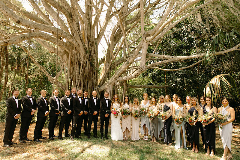 Bride and groom with wedding party at the Powel Crosley Estate in Sarasota