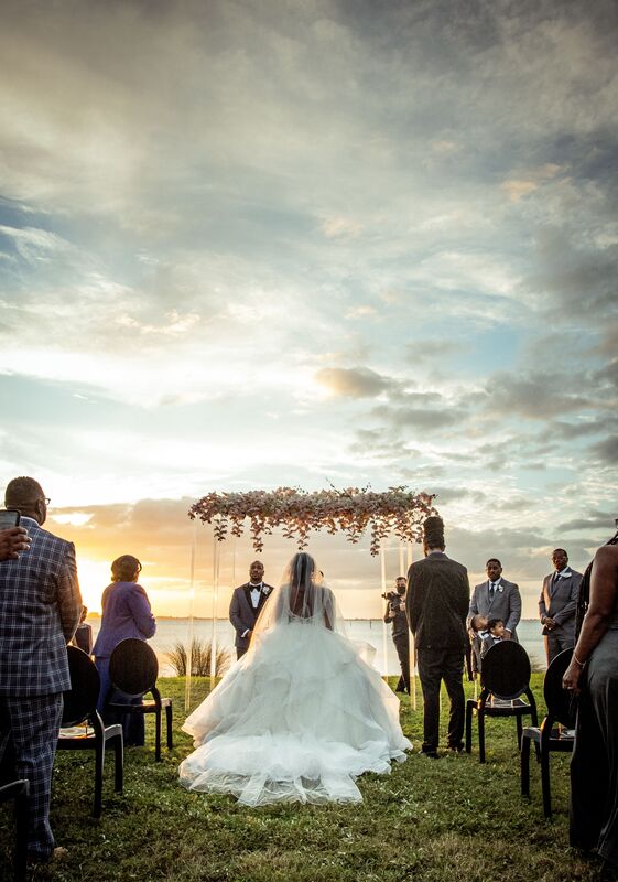 Sunset wedding ceremony at Powell Crosley Estate in Sarasota
