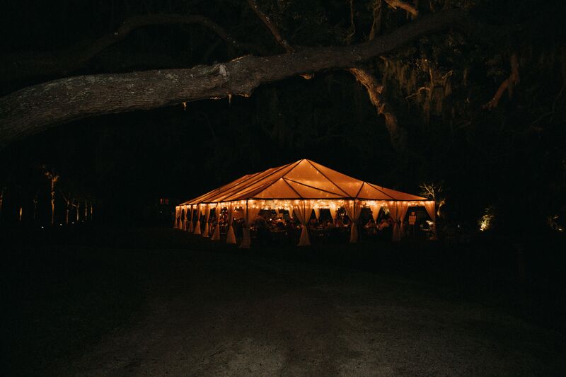 Bay Preserve at Osprey -Bay Preserve wedding – Sarasota wedding – Sarasota wedding planner – Sarasota luxury wedding planner - clear tent - tented wedding reception - clear tent at night - cleat tent with market lights- markets lights- clear tent at night with market lights