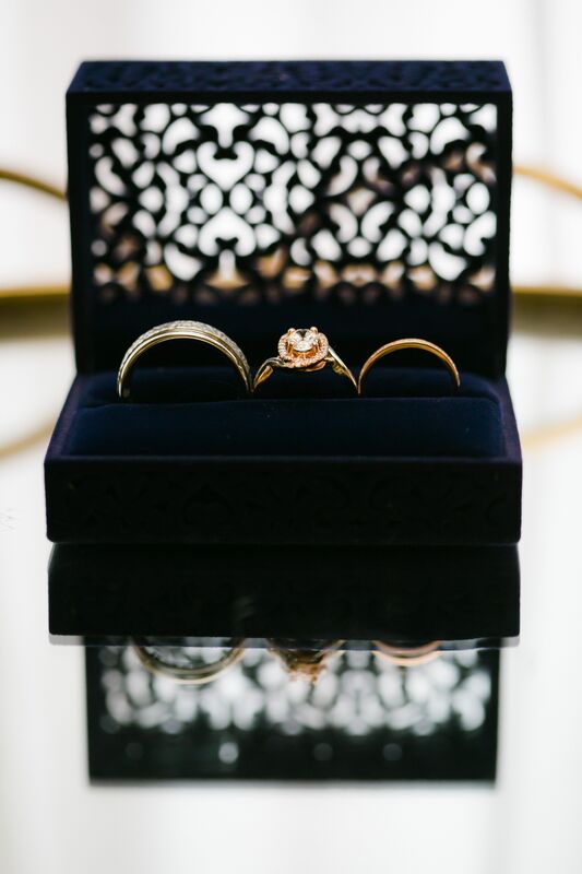 Wedding and engagement rings in blue velvet box