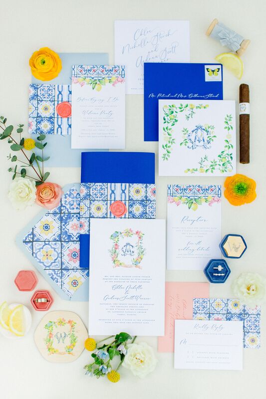 Beautiful pink, blue and yellow custom wedding invitations for an Amalfi Coast themed wedding