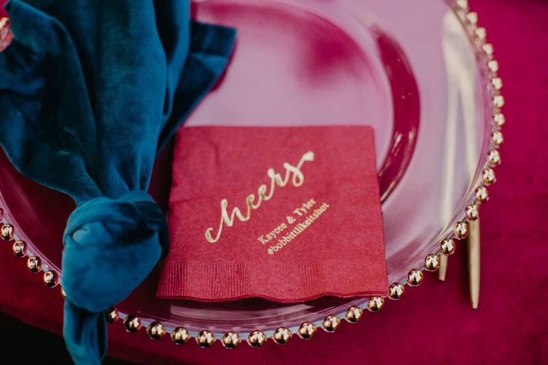 custom napkin in jewel tones at Sarasota intimate wedding
