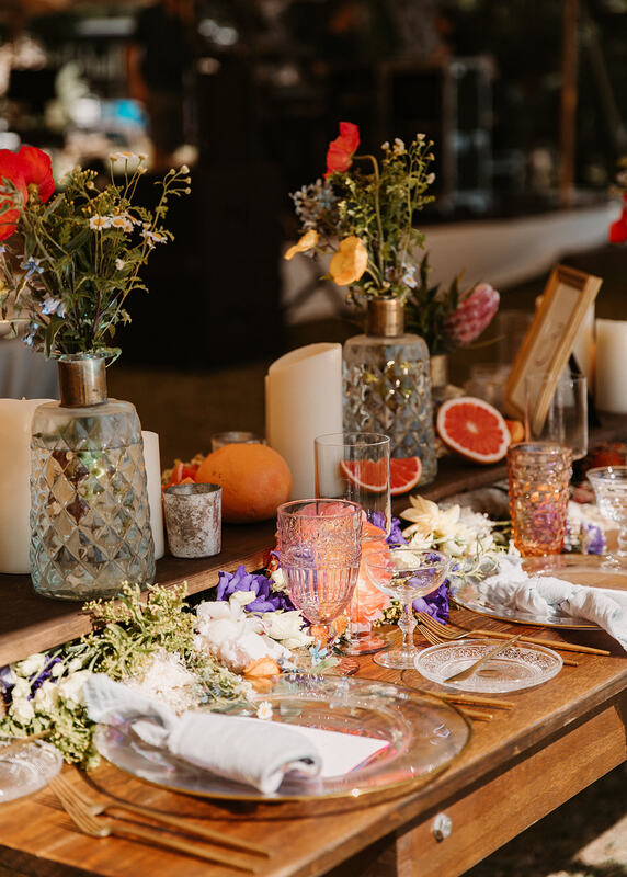 Chic wedding reception decor with bold colors and fresh citrus