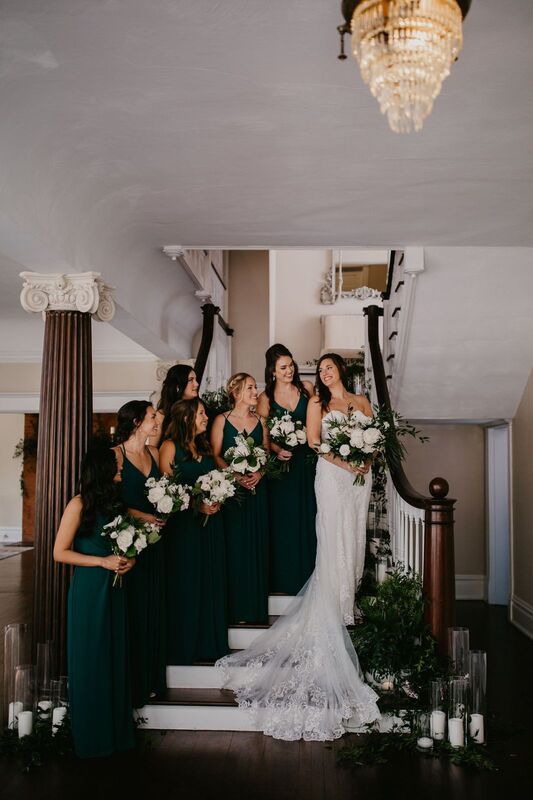 Bride and wedding party on the stairs at The Orlo in Tampa